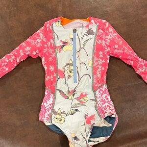 Floral Pink Kids One Piece long sleeved reversible bathing suit.